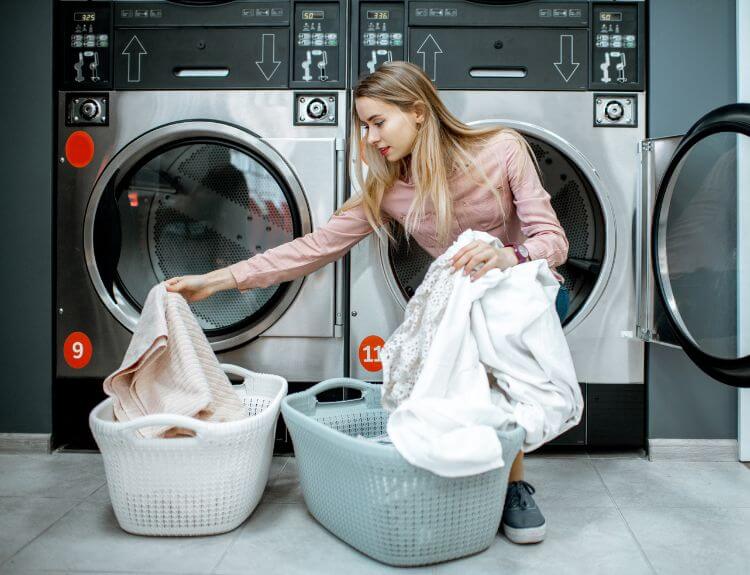 A personal assistant from TimeSquared adds an appointment to a family calendar, showcasing home organization and time-saving solutions.