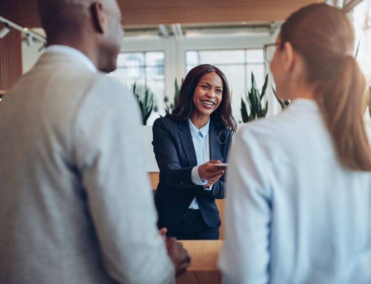 A professional personal concierge from TimeSquared organizing a client's schedule to provide lifestyle management services.