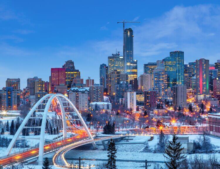 Downtown Edmonton blanketed in fresh snow, representing winter readiness and local concierge help.