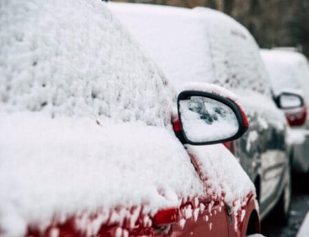 Snow-Covered Cars During Edmonton Parking Ban Season