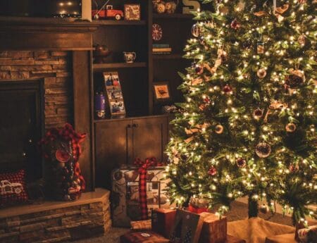 Cozy Living Room Staged with Christmas Tree and Gifts
